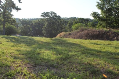 Tee Time is less than 5 minutes from your front door.  This on Holiday Hills Resort and Golf in Missouri - for sale on GolfHomes.com, golf home, golf lot