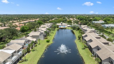 This lovely home overlooking the lake has been upgraded from on Boca Delray Golf and Country Club in Florida - for sale on GolfHomes.com, golf home, golf lot
