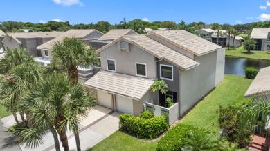 This lovely home overlooking the lake has been upgraded from on Boca Delray Golf and Country Club in Florida - for sale on GolfHomes.com, golf home, golf lot