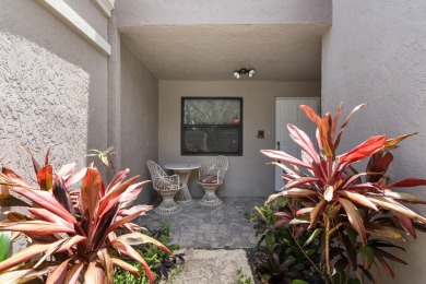 This lovely home overlooking the lake has been upgraded from on Boca Delray Golf and Country Club in Florida - for sale on GolfHomes.com, golf home, golf lot