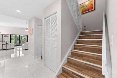 This lovely home overlooking the lake has been upgraded from on Boca Delray Golf and Country Club in Florida - for sale on GolfHomes.com, golf home, golf lot