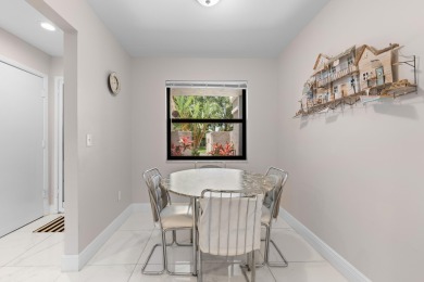 This lovely home overlooking the lake has been upgraded from on Boca Delray Golf and Country Club in Florida - for sale on GolfHomes.com, golf home, golf lot