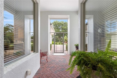 Nestled in the gated Harbor Hills community, this home offers a on Harbor Hills Country Club in Florida - for sale on GolfHomes.com, golf home, golf lot