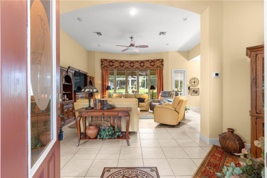 Nestled in the gated Harbor Hills community, this home offers a on Harbor Hills Country Club in Florida - for sale on GolfHomes.com, golf home, golf lot