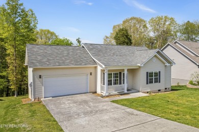 Don't miss this move-in ready 3-bedroom, 2-bath gem in the heart on Toqua Golf Course - Loudon County in Tennessee - for sale on GolfHomes.com, golf home, golf lot