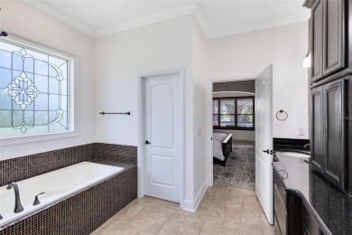 Welcome to your private retreat in the heart of Wedgefield, FL! on Wedgefield Golf Club in Florida - for sale on GolfHomes.com, golf home, golf lot