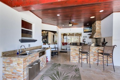 Welcome to your private retreat in the heart of Wedgefield, FL! on Wedgefield Golf Club in Florida - for sale on GolfHomes.com, golf home, golf lot