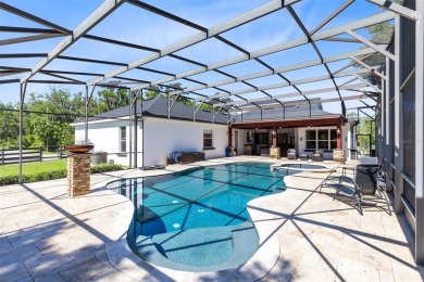 Welcome to your private retreat in the heart of Wedgefield, FL! on Wedgefield Golf Club in Florida - for sale on GolfHomes.com, golf home, golf lot