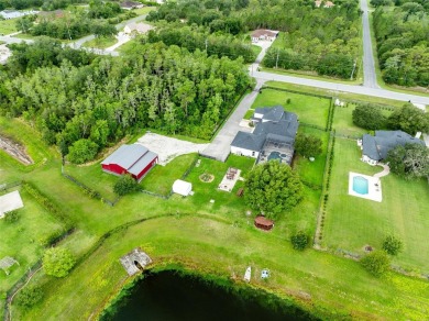 Welcome to your private retreat in the heart of Wedgefield, FL! on Wedgefield Golf Club in Florida - for sale on GolfHomes.com, golf home, golf lot