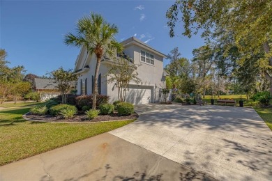 Discover a stunning retreat with breathtaking views the moment on Oak Grove Island Golf and Country Club in Georgia - for sale on GolfHomes.com, golf home, golf lot