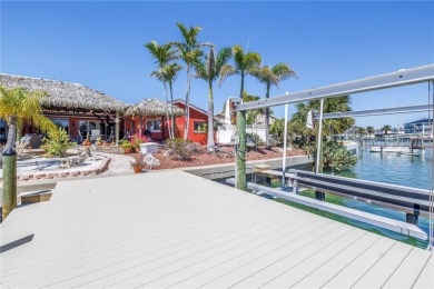 115 FEET OF SAILBOAT DEEP WATER-FRONTAGE ON ONE OF THE HIGHEST on Isla Del Sol Yacht and Country Club in Florida - for sale on GolfHomes.com, golf home, golf lot