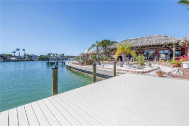 115 FEET OF SAILBOAT DEEP WATER-FRONTAGE ON ONE OF THE HIGHEST on Isla Del Sol Yacht and Country Club in Florida - for sale on GolfHomes.com, golf home, golf lot