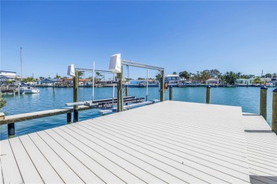 115 FEET OF SAILBOAT DEEP WATER-FRONTAGE ON ONE OF THE HIGHEST on Isla Del Sol Yacht and Country Club in Florida - for sale on GolfHomes.com, golf home, golf lot