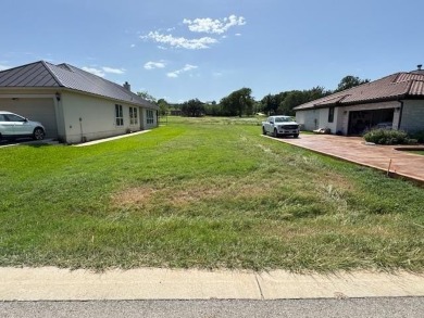 Neat Garden Home lot at Hole 15 of Apple Rock Golf Course in on Apple Rock Golf Course - Horseshoe Bay in Texas - for sale on GolfHomes.com, golf home, golf lot