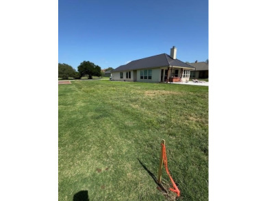 Neat Garden Home lot at Hole 15 of Apple Rock Golf Course in on Apple Rock Golf Course - Horseshoe Bay in Texas - for sale on GolfHomes.com, golf home, golf lot
