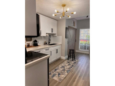 Step into this spacious 2-bedroom, 2.5-bath home that blends on Miccosukee Golf and Country Club in Florida - for sale on GolfHomes.com, golf home, golf lot