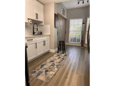 Step into this spacious 2-bedroom, 2.5-bath home that blends on Miccosukee Golf and Country Club in Florida - for sale on GolfHomes.com, golf home, golf lot
