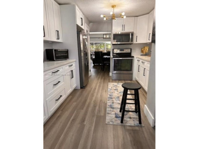 Step into this spacious 2-bedroom, 2.5-bath home that blends on Miccosukee Golf and Country Club in Florida - for sale on GolfHomes.com, golf home, golf lot