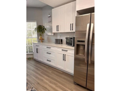 Step into this spacious 2-bedroom, 2.5-bath home that blends on Miccosukee Golf and Country Club in Florida - for sale on GolfHomes.com, golf home, golf lot