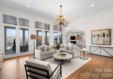 Stunning lakefront home in the exclusive gated community of on Carmel Country Club in North Carolina - for sale on GolfHomes.com, golf home, golf lot