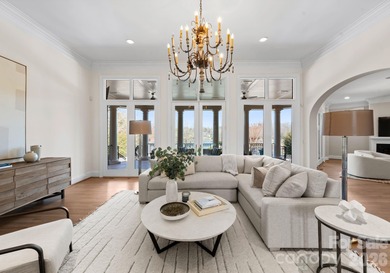 Stunning lakefront home in the exclusive gated community of on Carmel Country Club in North Carolina - for sale on GolfHomes.com, golf home, golf lot