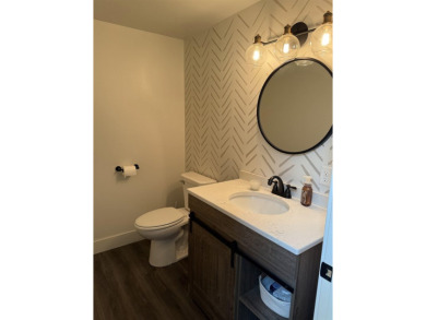Nestled in the heart of Lakewood, this beautifully updated home on McCauslin Brook Golf and Country Club in Wisconsin - for sale on GolfHomes.com, golf home, golf lot