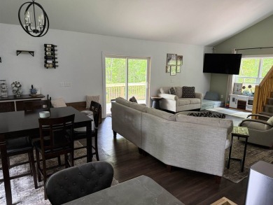 Nestled in the heart of Lakewood, this beautifully updated home on McCauslin Brook Golf and Country Club in Wisconsin - for sale on GolfHomes.com, golf home, golf lot