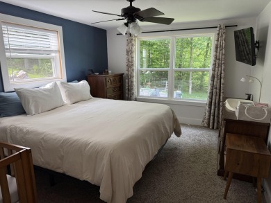 Nestled in the heart of Lakewood, this beautifully updated home on McCauslin Brook Golf and Country Club in Wisconsin - for sale on GolfHomes.com, golf home, golf lot