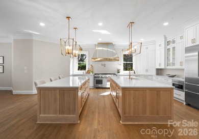 Stunning lakefront home in the exclusive gated community of on Carmel Country Club in North Carolina - for sale on GolfHomes.com, golf home, golf lot