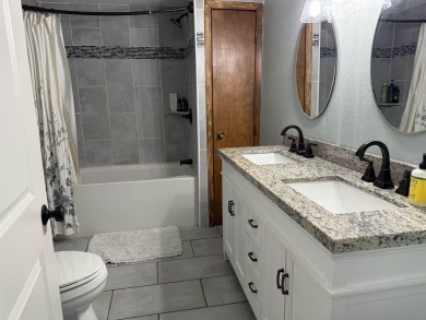 Nestled in the heart of Lakewood, this beautifully updated home on McCauslin Brook Golf and Country Club in Wisconsin - for sale on GolfHomes.com, golf home, golf lot