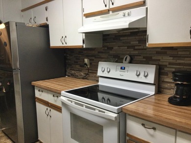 Meticulously maintained home in the much sought after Spanish on Spanish Lakes I in Florida - for sale on GolfHomes.com, golf home, golf lot