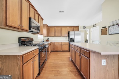 Welcome home to sought-after Heron Bay Golf & Swim Community on Canongate At Heron Bay in Georgia - for sale on GolfHomes.com, golf home, golf lot