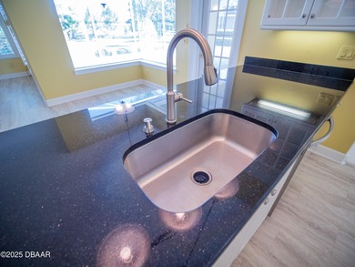 Immaculate Golf Course Home on Corner Lot with Split Floor Plan on Plantation Bay Golf and Country Club in Florida - for sale on GolfHomes.com, golf home, golf lot