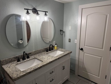 Nestled in the heart of Lakewood, this beautifully updated home on McCauslin Brook Golf and Country Club in Wisconsin - for sale on GolfHomes.com, golf home, golf lot