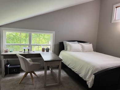 Nestled in the heart of Lakewood, this beautifully updated home on McCauslin Brook Golf and Country Club in Wisconsin - for sale on GolfHomes.com, golf home, golf lot