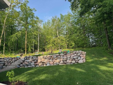 Nestled in the heart of Lakewood, this beautifully updated home on McCauslin Brook Golf and Country Club in Wisconsin - for sale on GolfHomes.com, golf home, golf lot