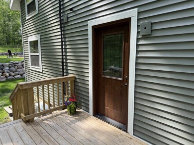 Nestled in the heart of Lakewood, this beautifully updated home on McCauslin Brook Golf and Country Club in Wisconsin - for sale on GolfHomes.com, golf home, golf lot