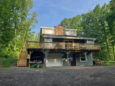 Nestled in the heart of Lakewood, this beautifully updated home on McCauslin Brook Golf and Country Club in Wisconsin - for sale on GolfHomes.com, golf home, golf lot
