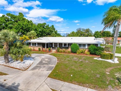 LISTED BELOW APPRAISED VALUE! Located in the highly sought after on Village Green Golf Club of Sarasota in Florida - for sale on GolfHomes.com, golf home, golf lot