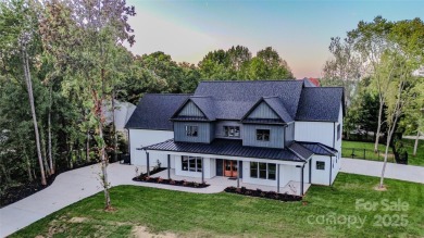 Welcome to this extraordinary new custom home, a 5,000+ sq ft on Mallard Head Country Club in North Carolina - for sale on GolfHomes.com, golf home, golf lot