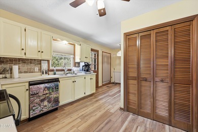 This 3-bedroom, 2-bath beauty sits on two very private lots on Bent Creek Golf Course in Tennessee - for sale on GolfHomes.com, golf home, golf lot