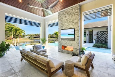 Nestled on a private and serene .73-acre lake-view cul de sac on Grey Oaks Golf and Country Club in Florida - for sale on GolfHomes.com, golf home, golf lot