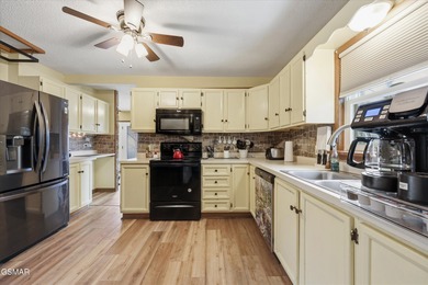 This 3-bedroom, 2-bath beauty sits on two very private lots on Bent Creek Golf Course in Tennessee - for sale on GolfHomes.com, golf home, golf lot