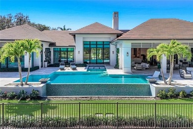 Nestled on a private and serene .73-acre lake-view cul de sac on Grey Oaks Golf and Country Club in Florida - for sale on GolfHomes.com, golf home, golf lot