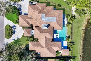 Nestled on a private and serene .73-acre lake-view cul de sac on Grey Oaks Golf and Country Club in Florida - for sale on GolfHomes.com, golf home, golf lot