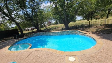 REDUCED!!!!!!3-2 REMODELED LOCATED ON A GREENBELT.SPARKLING on Lost Creek Golf Course in Texas - for sale on GolfHomes.com, golf home, golf lot