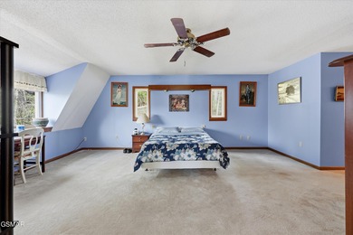 This 3-bedroom, 2-bath beauty sits on two very private lots on Bent Creek Golf Course in Tennessee - for sale on GolfHomes.com, golf home, golf lot