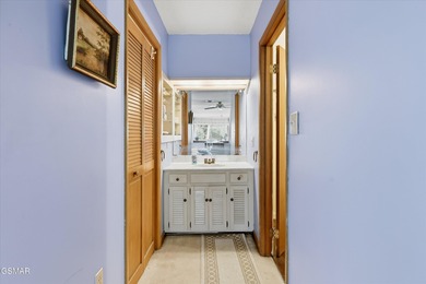 This 3-bedroom, 2-bath beauty sits on two very private lots on Bent Creek Golf Course in Tennessee - for sale on GolfHomes.com, golf home, golf lot