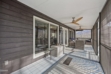 This 3-bedroom, 2-bath beauty sits on two very private lots on Bent Creek Golf Course in Tennessee - for sale on GolfHomes.com, golf home, golf lot