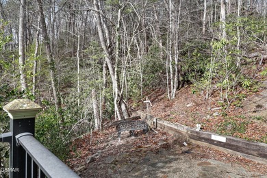 This 3-bedroom, 2-bath beauty sits on two very private lots on Bent Creek Golf Course in Tennessee - for sale on GolfHomes.com, golf home, golf lot